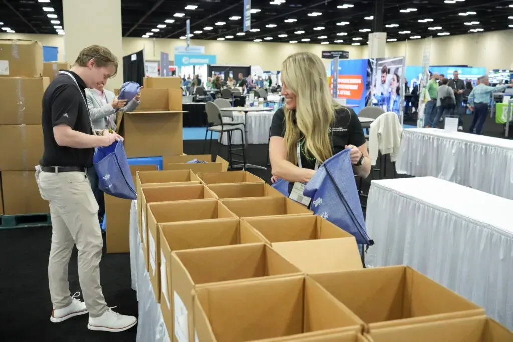 Boxes being packed at a convention